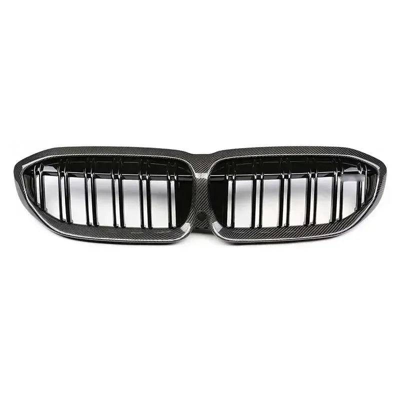 Double-slat kidney grille with carbon frame and gloss black slats, head-on – BMW G20 3 Series