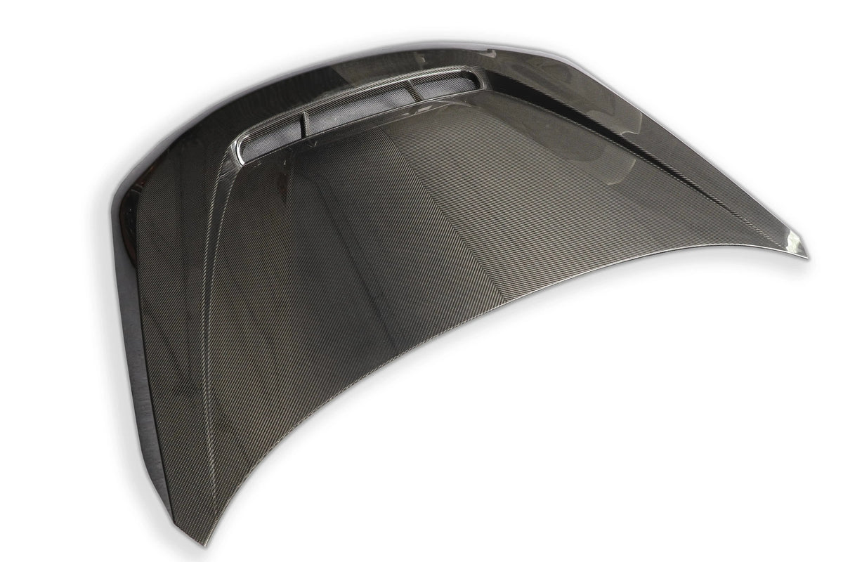 Carbon fiber motorháztető hátsó 3/4 nézetből, a szellőzővel (AN Style) – BMW G87 M2