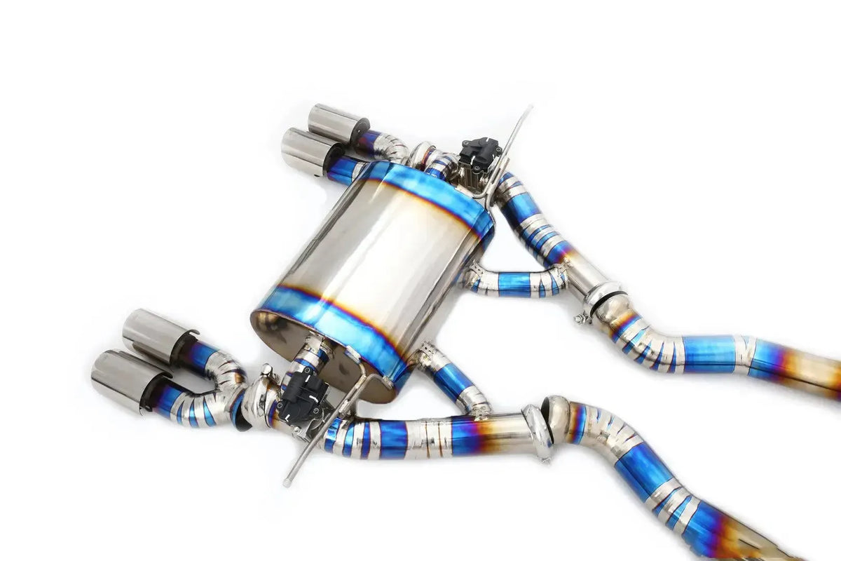 Titanium rear muffler with valves, close-up, polished quad exhaust tips – BMW F80 M3 / F82 M4
