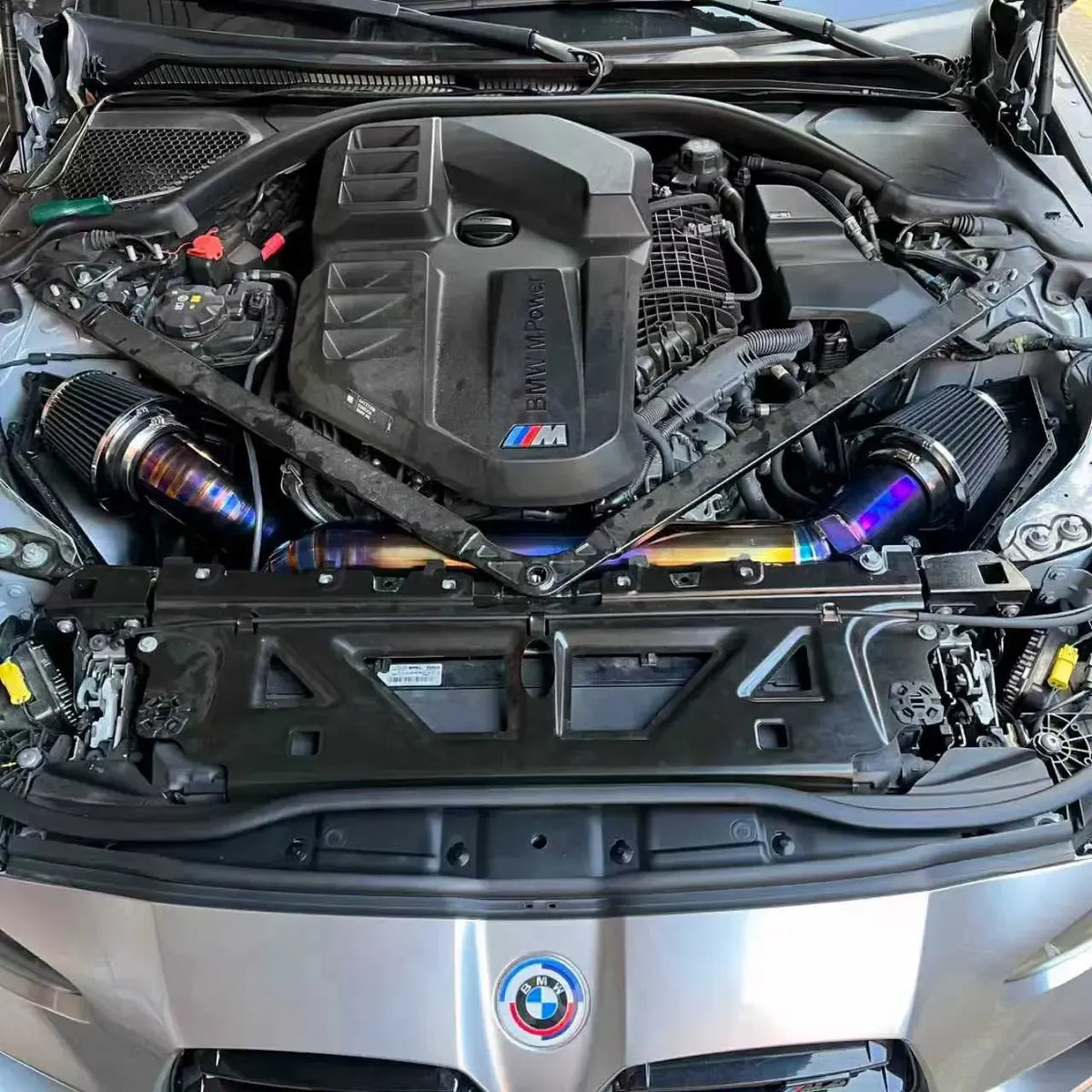 S58 engine bay with installed titanium Top mount intake system and black filters – BMW G87 M2 / G80 M3 / G82 M4