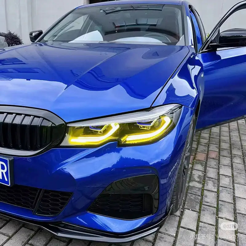 Vibráló kék bmw sedan fekete karbon kipufogó rendszerrel és sárga led drl csl lámpa modullal minden g szériához