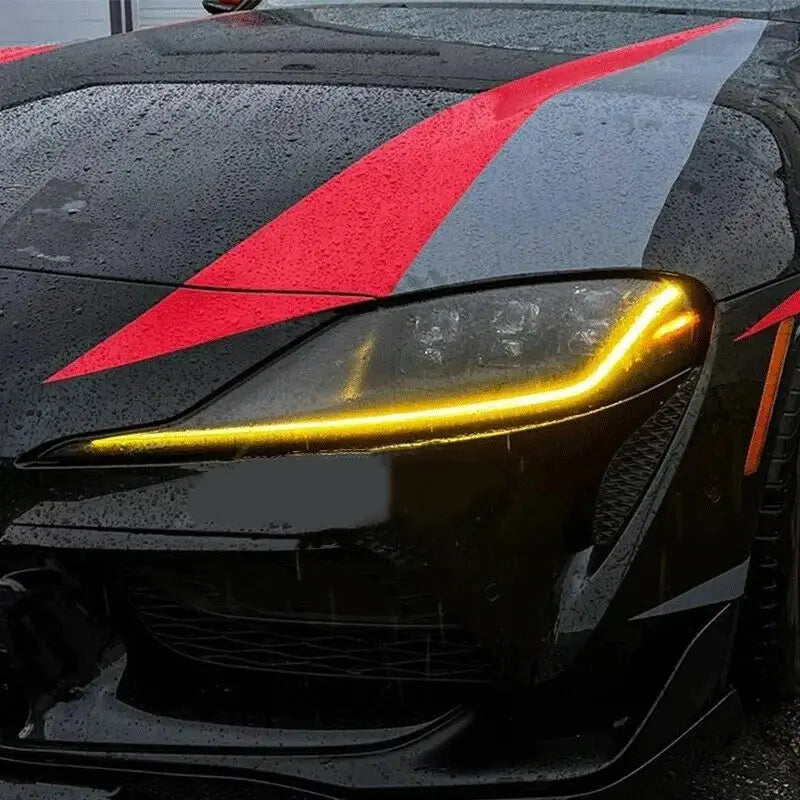 Fekete bmw m3 kipufogóhoz illő drl csl lámpa modul sárga led fénnyel piros és ezüst versenycsíkkal
