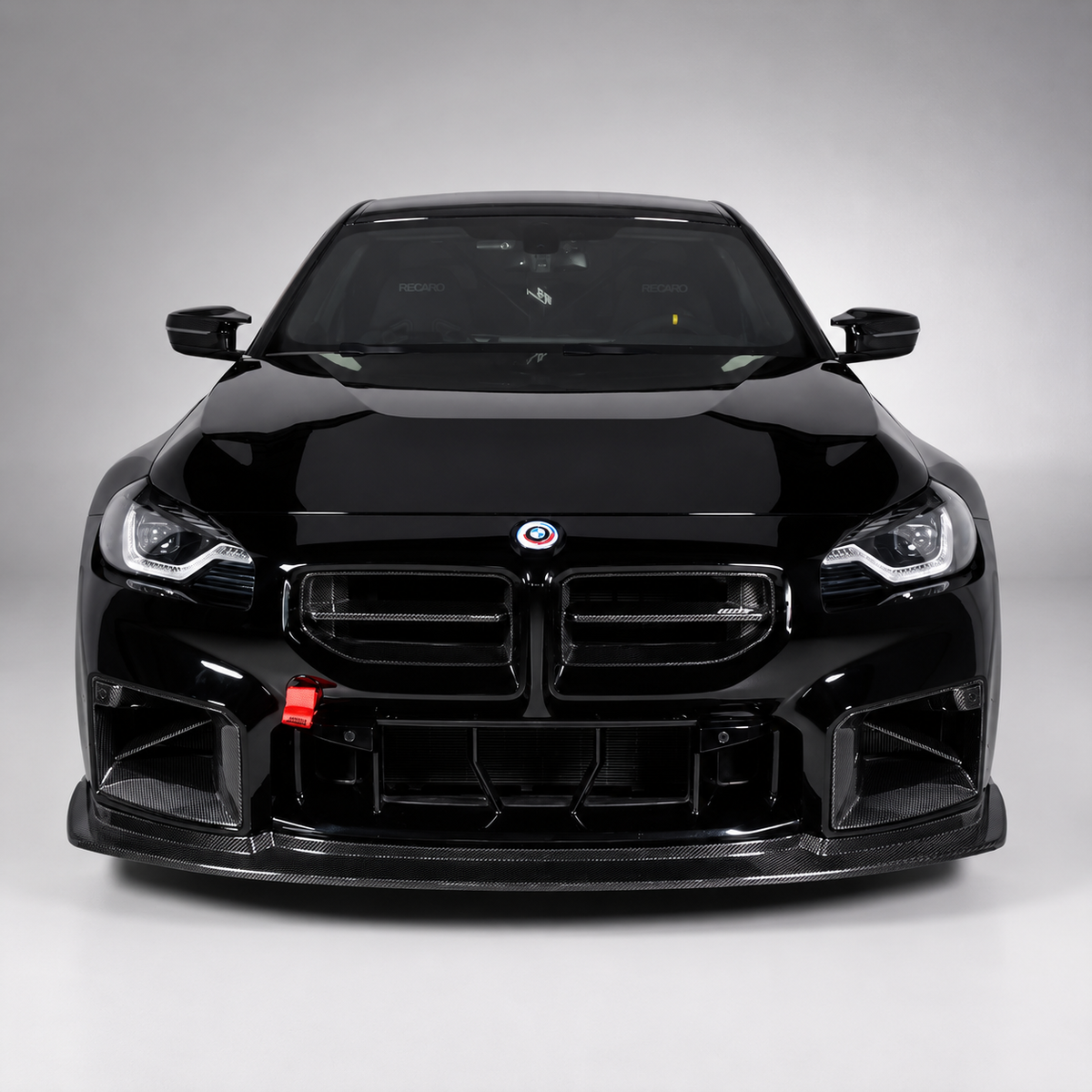 Fekete BMW G87 M2 carbon fiber első koptatóval (GT Style)