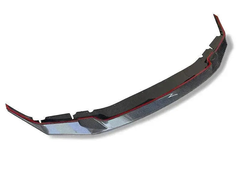 One-piece carbon front lip, angled three-quarter view, on a white background (GTS Style) – BMW F90 M5