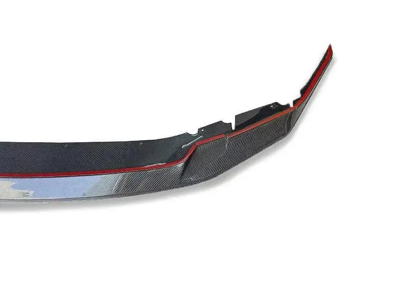 Close-up of the carbon front lip end piece, on a white background (GTS Style) – BMW F90 M5