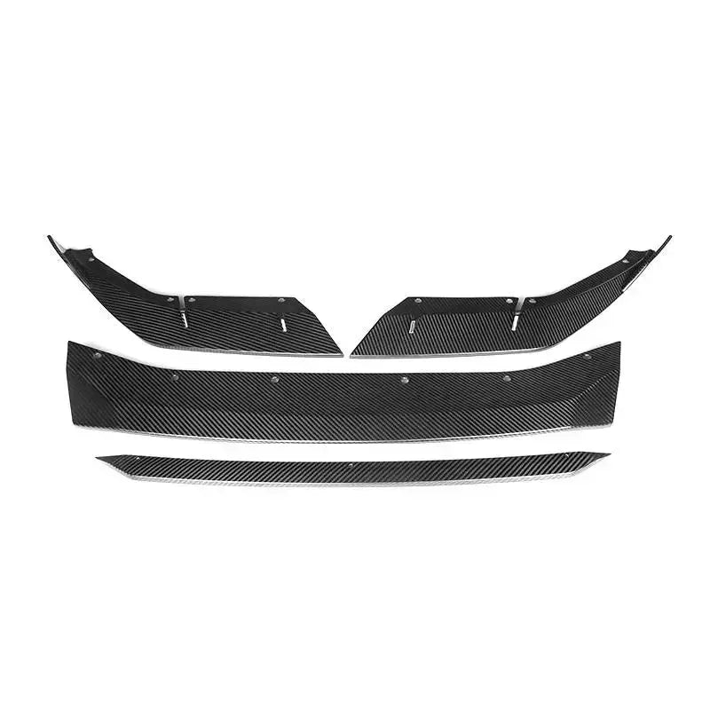 Four-piece carbon front lip pieces laid out, top view (MT Style) – BMW F90 M5