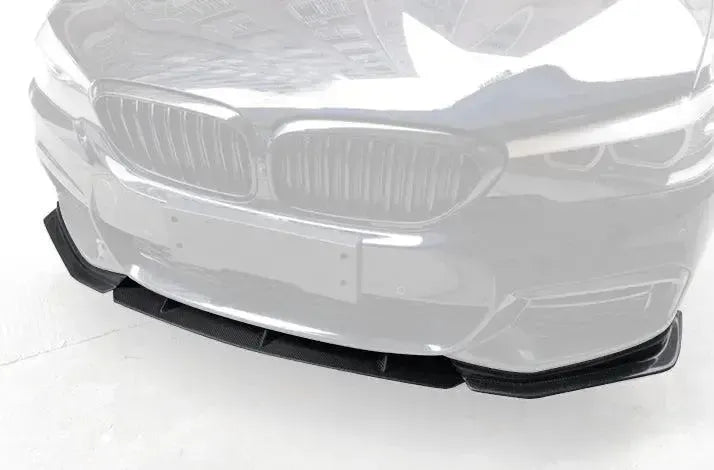 Faded front of a pre-LCI BMW G30 M Sport, with the carbon front lip highlighted (FD Style)