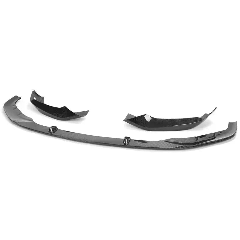 Three separate pieces of the carbon front lip from an angle (MP Style) – BMW G30 5 Series