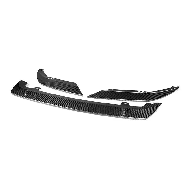 3 separate pieces of the carbon front lip from an angle, on a white background (Signature Style) – BMW F90 M5