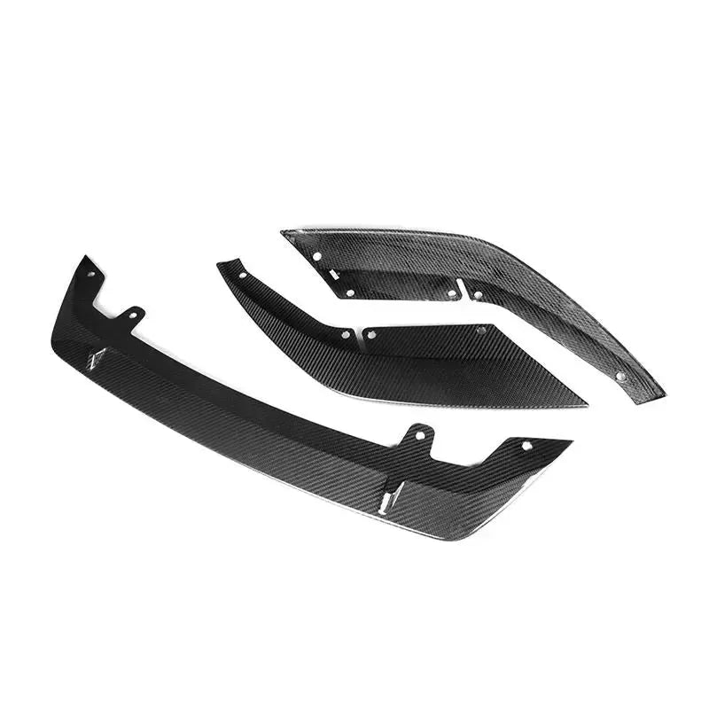 Three-piece carbon front lip, angled top view (Signature Style) – BMW F90 M5