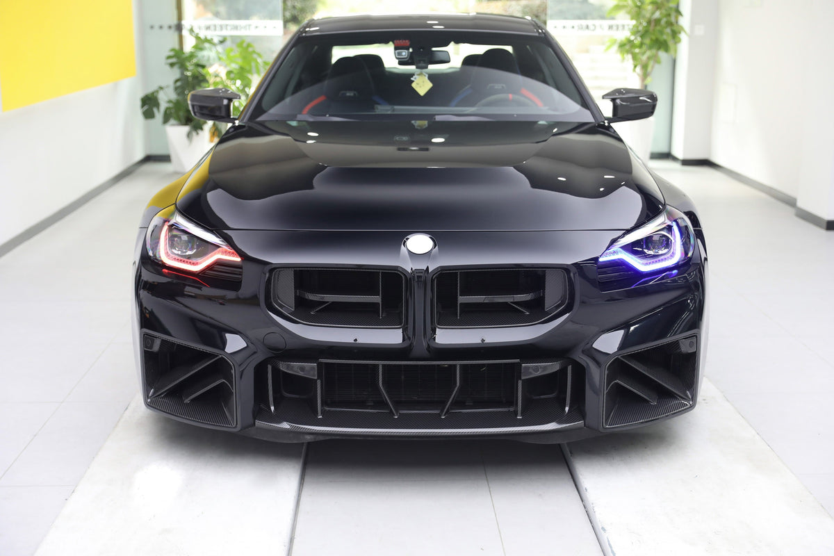 Fekete BMW G87 M2 carbon fiber középső beömlő kerettel (PM V1 Style)