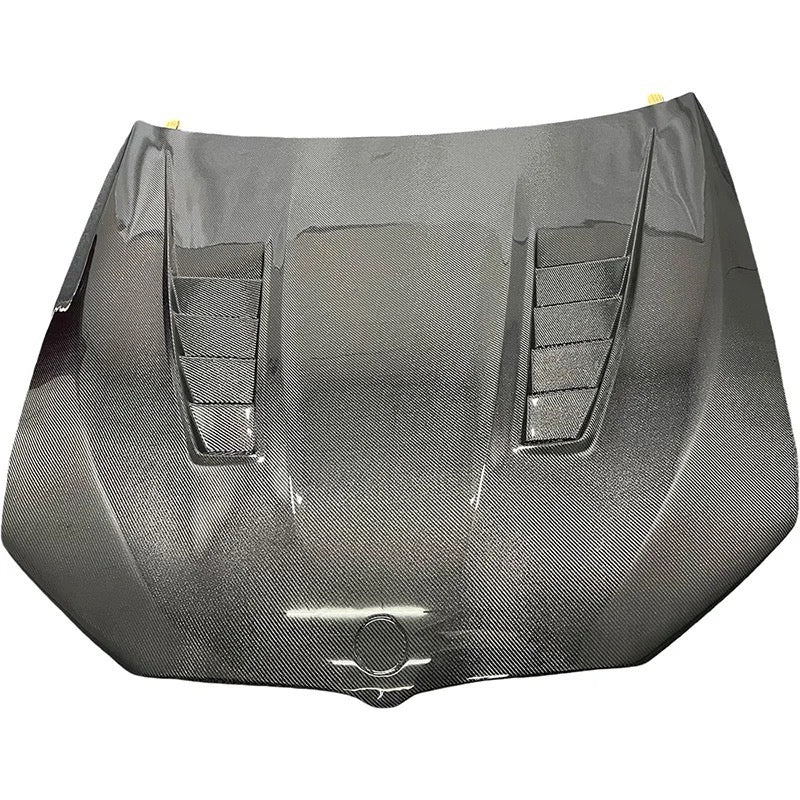 Carbon hood with two louvered vents, top view, on a white background (Dome Style) – BMW F90 M5