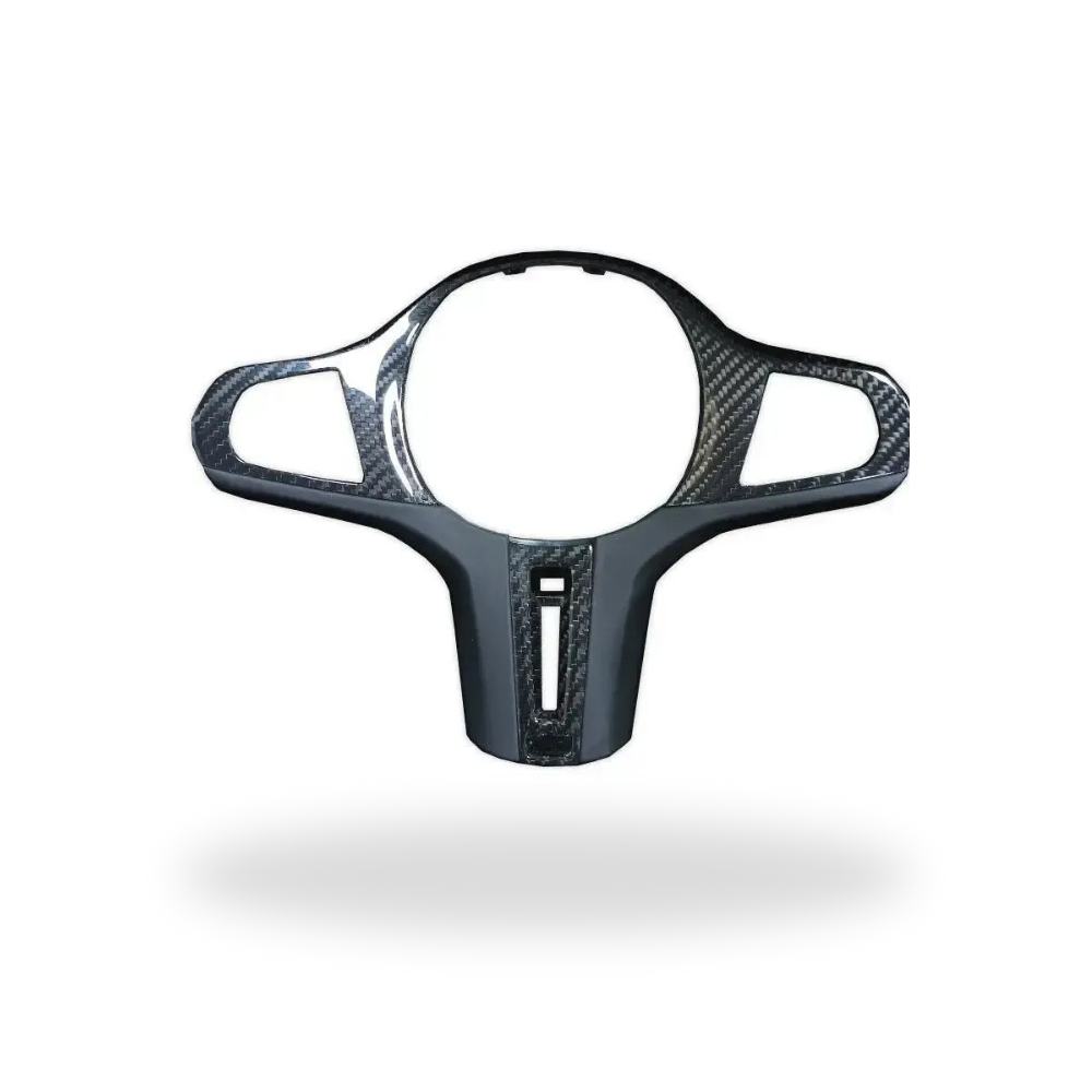 Carbon steering wheel trim with lower spoke and vertical cutout, on a white background – BMW F90 M5 and G30 5 Series