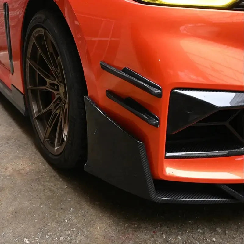 Narancssárga BMW G87 M2 carbon fiber első légterelőkkel (canards, CT Style)