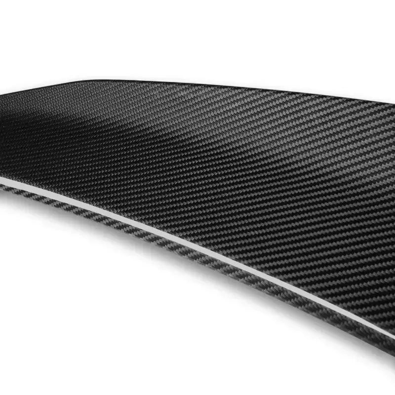 Close-up of the carbon spoiler edge and weave pattern (PSM Style High Kick) – BMW F90 M5 and G30 5 Series