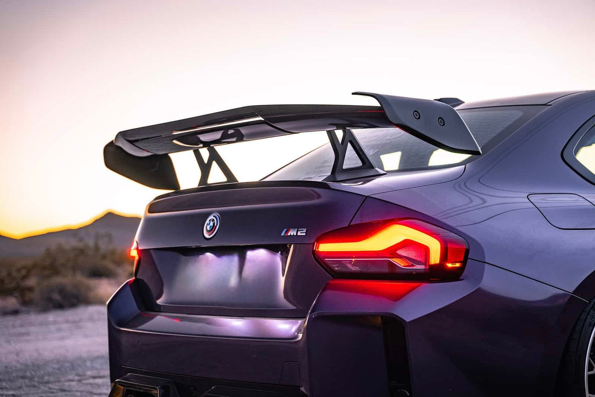 Purple BMW G87 M2 with carbon fiber rear wing (AD V3 Style)