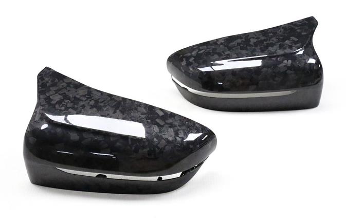 Forged carbon M-style mirror cap pair on a white background – BMW F90 M5
